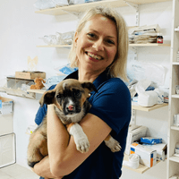 Manuela Rowlings with rescued puppy