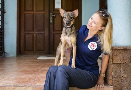 Veterinarian Dr Katherine Polak with Sopol, a dog rescued from the meat trade by FOUR PAWS