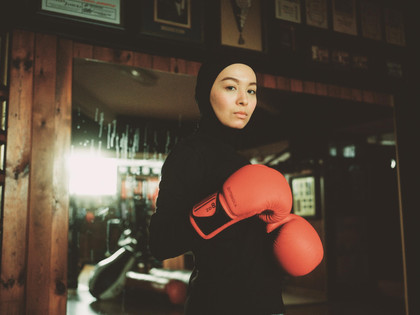 Girl boxing in a gym