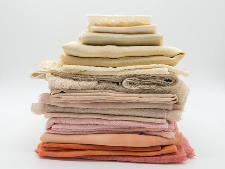 Different fabrics folded in a pile